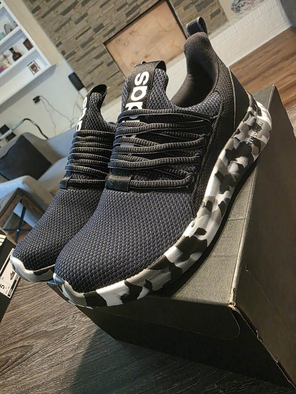 adidas Black Slip-On Athletic Sneakers with Black-and-White Camouflage Sole